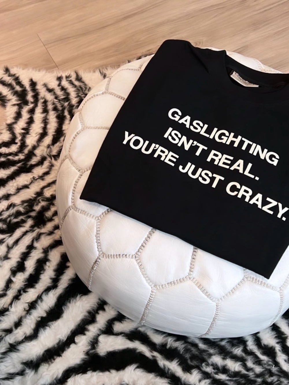 Coverage Black Graphic Tee "Gaslighting Isn't Real. You're Just Crazy."